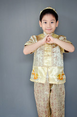 little boy wishing you a happy chinese new year