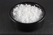 Sea salt flakes, in bowl .