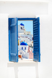 Fototapeta  - Open traditional Greek blue window on Santorini island, Greece
