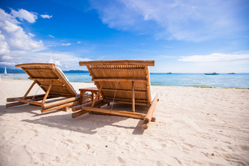 Wall Mural - Beach wooden chairs for vacations and summer getaways in Boracay