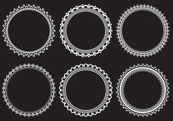 Fototapete - Set of round frames on a black background