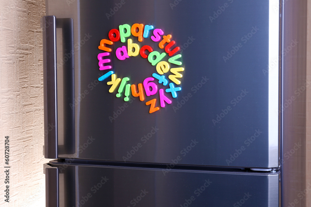 Colorful magnetic letters on  refrigerator