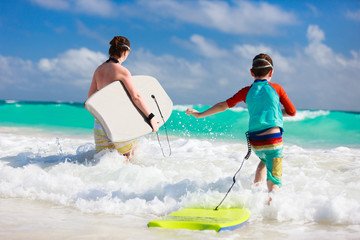 Wall Mural - Mother and son with boogie boards