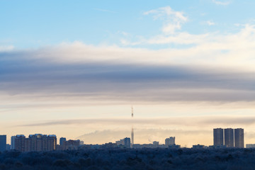 Canvas Print - early morning cloudscape over city park