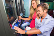 © william87 - Group of Friend Playing with Slot Machines