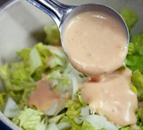 Portioned Out Serving Of Creamy Thousand Island Salad Dressing