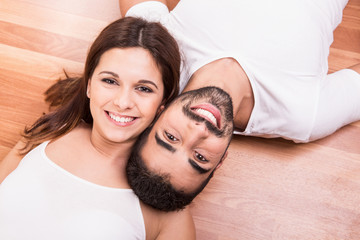 Poster - Couple relaxing on the floor