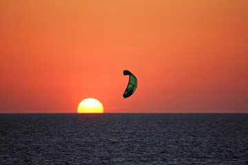 Poster - kitesurfer at sunset