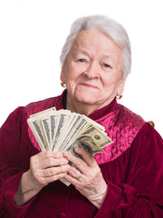 Smiling old woman holding money