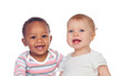 © Gelpi - Couple of Babies African and Caucasian laughing