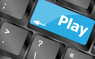 Poster - computer keyboard with play key - technology background