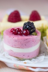 Wall Mural - Pink cake with mousse from berries, diet dessert