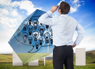 Poster - Composite image of thinking businessman tilting glasses