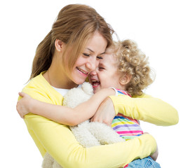 hugging mother and kid girl