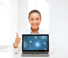 Wall Mural - smiling woman with laptop computer