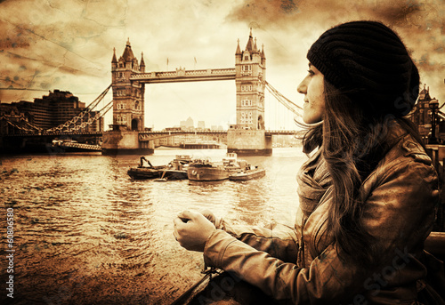 Fotografering Vintage Retro Picture of Girl in Front of Tower Bridge, London