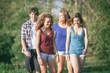 © william87 - Group of Teenage Friends Walking at Park