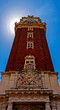 tower in the glare of the sun and sky