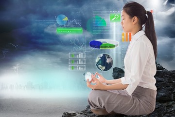 Poster - Composite image of businesswoman sitting in lotus pose