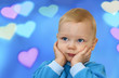 © natalinka29 - Portrait of the happy boy on a background with hearts