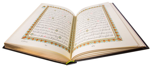 The Holy Quran over white background