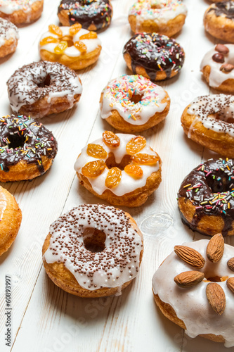 Obraz w ramie Large group of glazed donuts