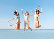 © Syda Productions - girls jumping on the beach