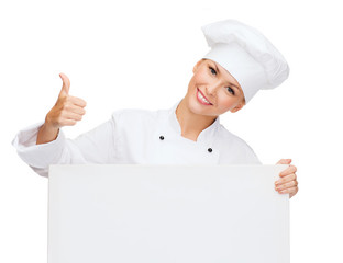 Poster - smiling female chef with white blank board