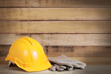 Yellow hardhat and leather gloves