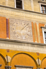 Wall Mural - Low angle view of a clock on the wall of a building