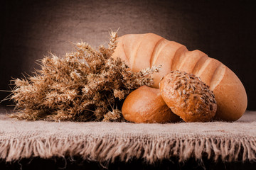 Assortment of breads and ears bunch still life