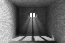 Prison Interior With Light Shining Through A Barred Window