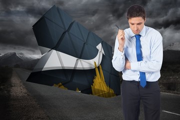 Poster - Composite image of thinking businessman holding pen