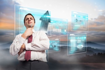 Poster - Composite image of thoughtful businessman holding pen to chin