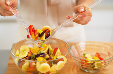 Wall Mural - Closeup on young housewife serving fruit salad