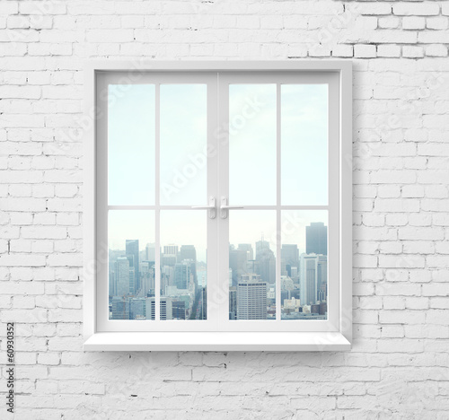 Fototapeta na wymiar window with skyscraper view