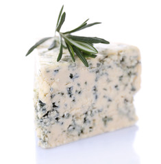 Tasty blue cheese with rosemary, isolated on white