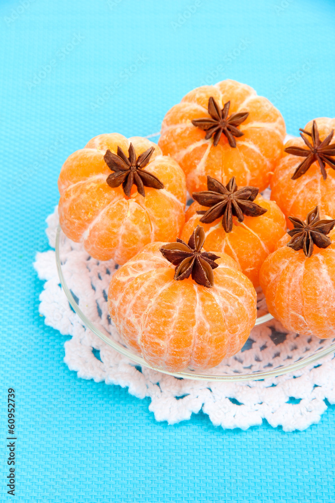 Ripe sweet tangerines, on color background