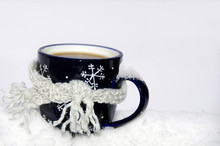 Coffee Mug In Snow With Scarf