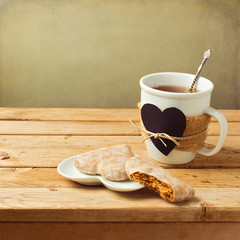 Wall Mural - Tea cup with honey cake for Valentine's day