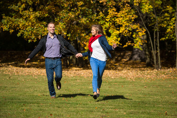 Wall Mural - Healthy lifestyle - woman and man running in park