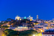Skyline of Rome from Aventino Hill by night