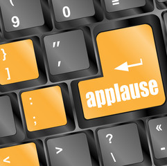 Poster - Computer keyboard with applause key - business concept