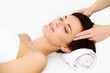 © puhhha - Face Massage. Close-up of a Young Woman Getting Treatment in Spa