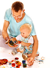 Fototapete - Child painting by finger paint.