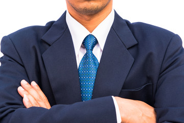 Businessman standing with closed posture, isolated