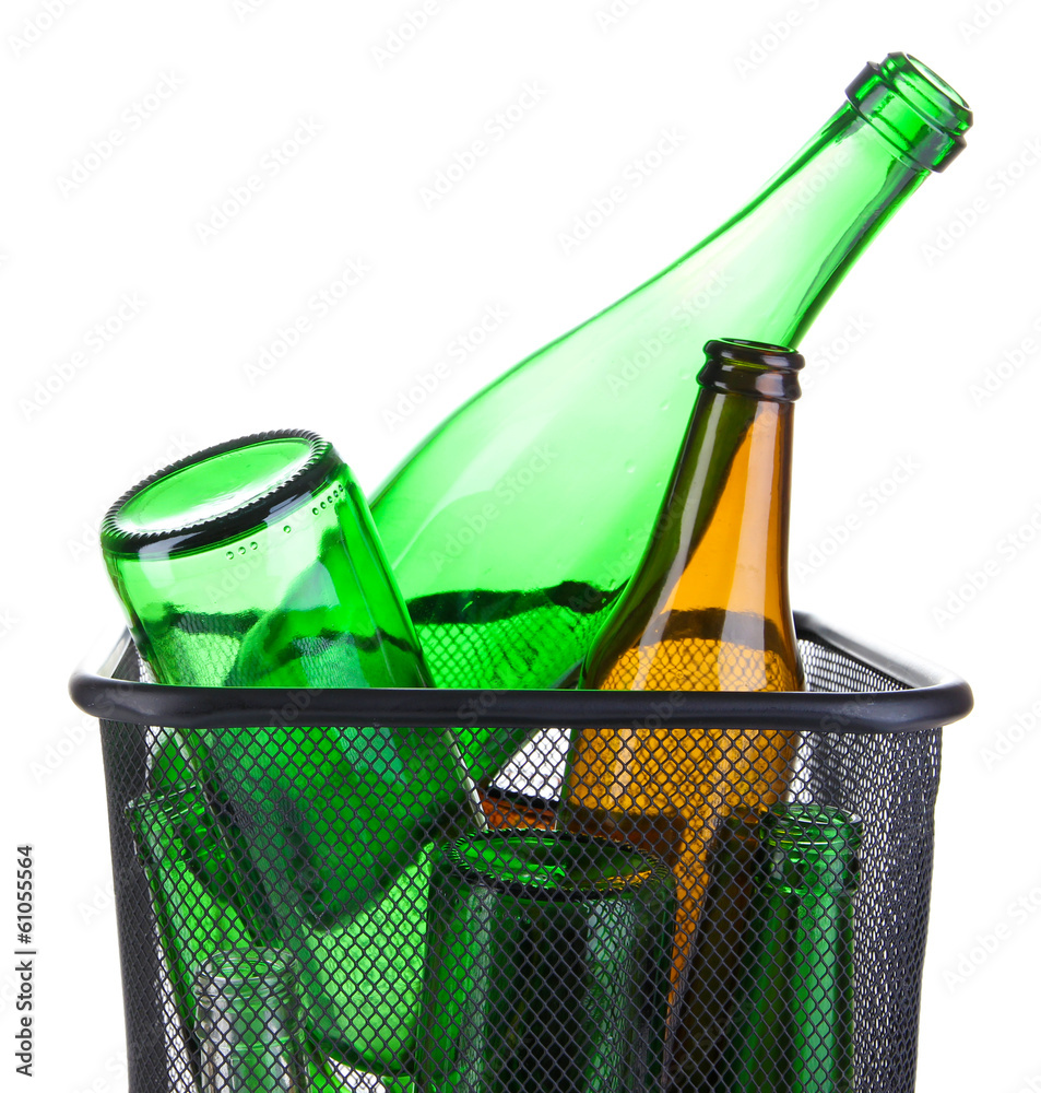 Glass bottles in recycling bin isolated on white