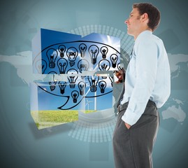 Poster - Composite image of happy businessman standing with hand in