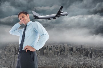 Poster - Composite image of thinking businessman with hand on head