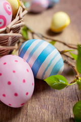  Colorful Easter eggs on a wooden table